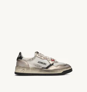 AUTRY SNEAKERS WOMAN  MEDALIST LOW SUPER VINTAGE SNEAKERS IN WHITE MESH  GOLD SUEDE AND BLACK LEATHER